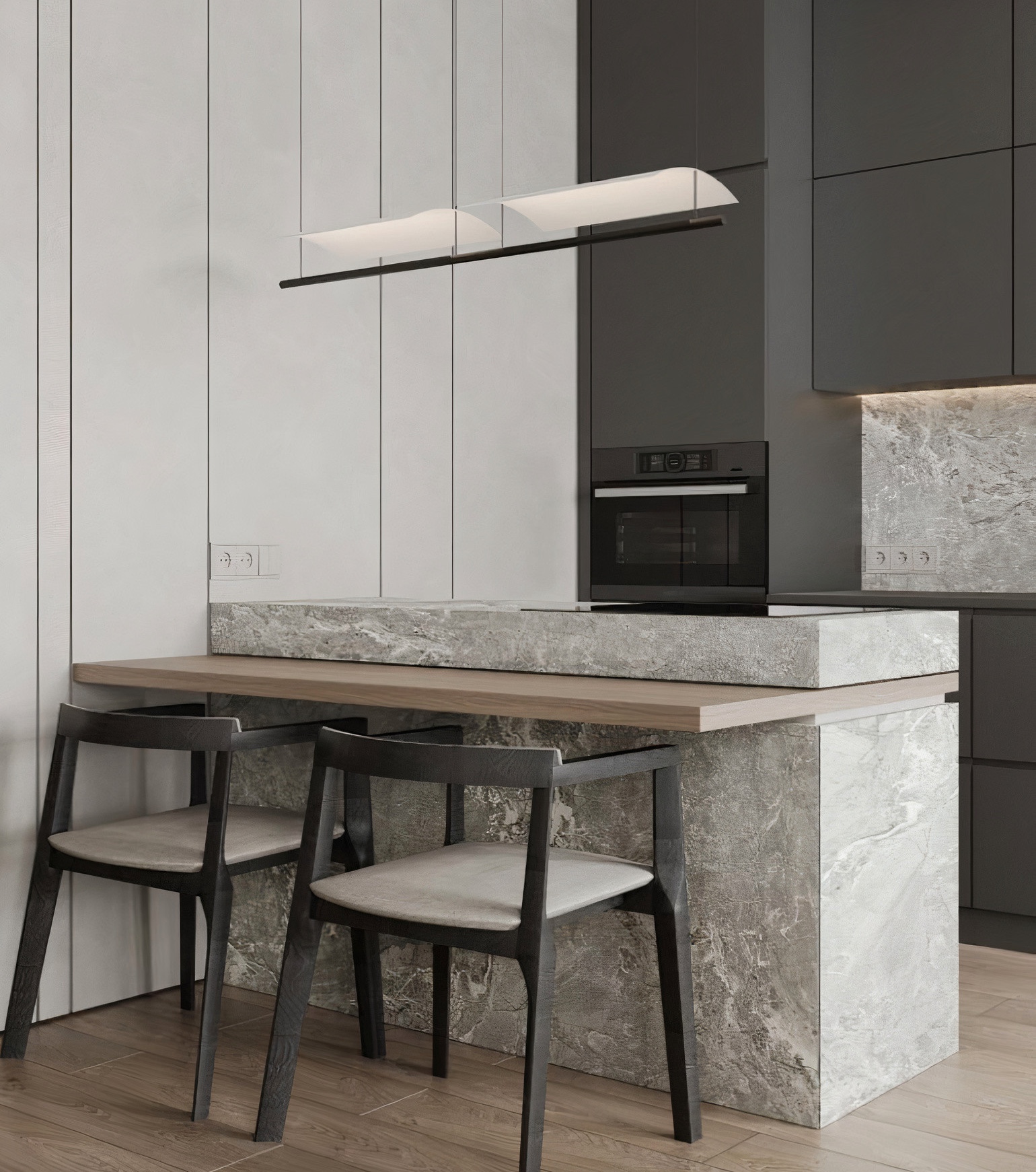 吧檯式中島設計案例：灰色大理石紋理中島拼接淺色木質餐桌，搭配黑色質感餐椅與內嵌式廚電，打造機能重疊且具高度設計感的現代餐廚合一空間。